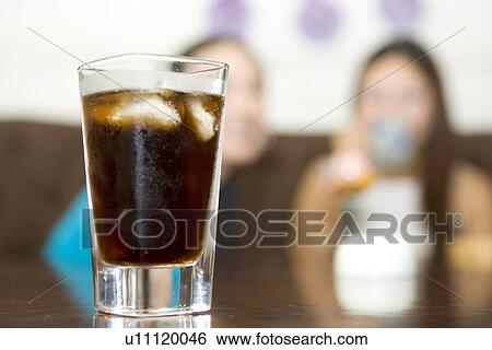 Indoors, Young Adult, Young Men, Young Women, Young Couple, Togetherness View Large Photo Image Stock Photograph - Indoors, Young Adult, Young Men, Young Women, Young Couple, Togetherness. Fotosearch