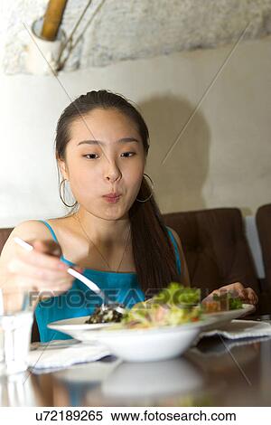Stock Photography - Indoors, Young Adult, Young Men, Young Women, Young Couple, Togetherness. Fotosearch