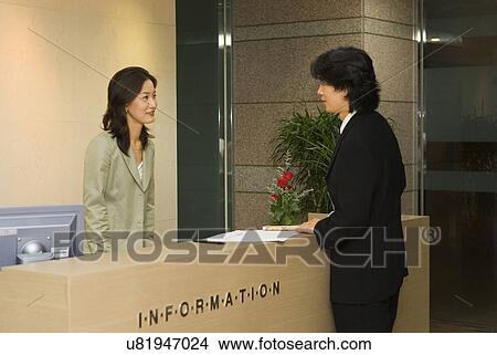 Picture - Occupation, Profession, Indoors, Urban, Lifestyles, Day, Formal Clothing. Fotosearch