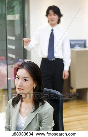 Picture - Occupation, Profession, Indoors, Urban, Lifestyles, Day, Formal Clothing. Fotosearch