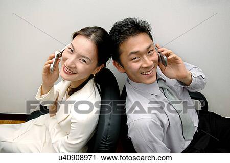Stock Image - Occupation, Profession, Indoors, Urban, Lifestyles, Day, Formal Clothing. Fotosearch