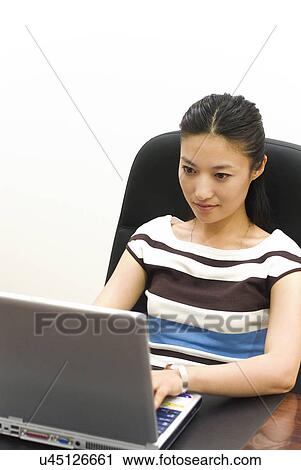 Stock Image - Occupation, Profession, Indoors, Urban, Lifestyles, Day, Formal Clothing. Fotosearch