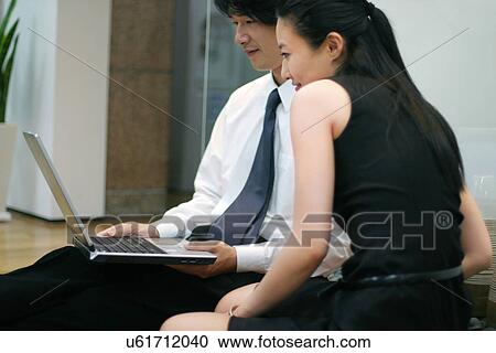 Stock Image - Occupation, Profession, Indoors, Urban, Lifestyles, Day, Formal Clothing. Fotosearch