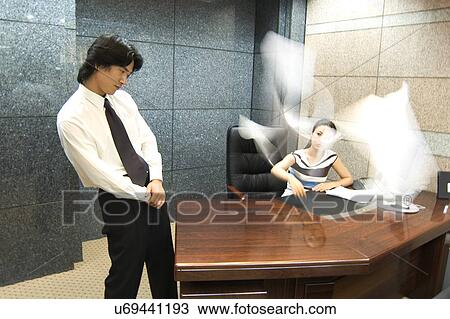 Stock Image - Occupation, Profession, Indoors, Urban, Lifestyles, Day, Formal Clothing. Fotosearch