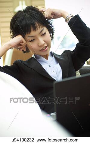 Stock Image - Occupation, Profession, Indoors, Urban, Lifestyles, Day, Formal Clothing. Fotosearch