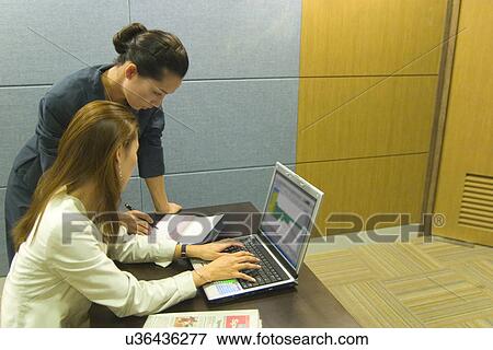 Stock Photo - Occupation, Profession, Indoors, Urban, Lifestyles, Day, Formal Clothing. Fotosearch