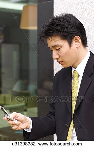 Stock Image - Occupation, Profession, Urban, Lifestyles, Day, Office, Formal Clothing. Fotosearch