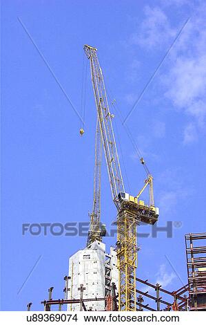 Outdoors, Day, Dusk, Engineering, Industrial, Crane, Sky View Large Photo Image Picture - Outdoors, Day, Dusk, Engineering, Industrial, Crane, Sky. Fotosearch