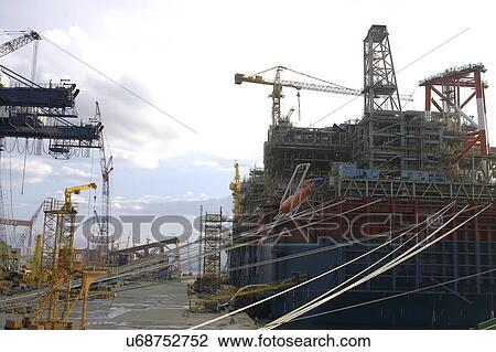 Outdoors, Day, Dusk, Engineering, Industrial, Crane, Sky View Large Photo Image Stock Image - Outdoors, Day, Dusk, Engineering, Industrial, Crane, Sky. Fotosearch