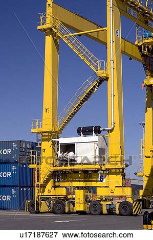 Stock Photo - Outdoors, Day, Dusk, Engineering, Industrial, Crane, Sky. Fotosearch