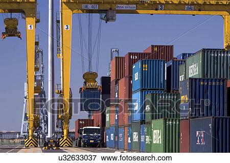 Stock Photo - Outdoors, Day, Dusk, Engineering, Industrial, Crane, Sky. Fotosearch