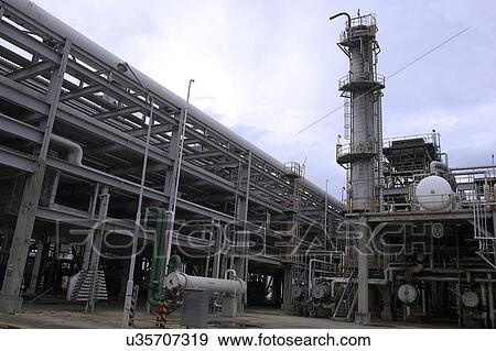 Stock Photo - Outdoors, Day, Dusk, Engineering, Industrial, Crane, Sky. Fotosearch