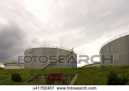 Stock Photo - Outdoors, Day, Dusk, Engineering, Industrial, Crane, Sky. Fotosearch