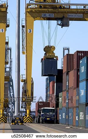 Stock Photo - Outdoors, Day, Dusk, Engineering, Industrial, Crane, Sky. Fotosearch