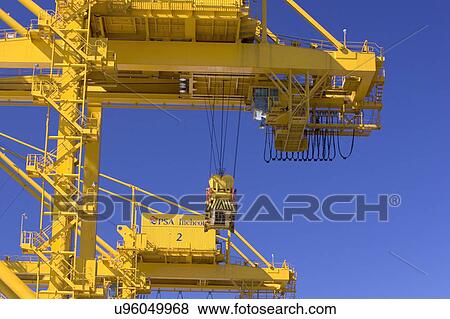 Stock Photo - Outdoors, Day, Dusk, Engineering, Industrial, Crane, Sky. Fotosearch