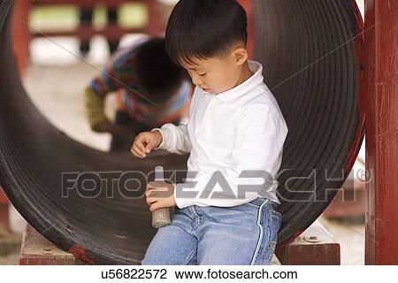 Outdoors, Day, Kids, Children, Playing, Playful, Playground View Large Photo Image Stock Image - Outdoors, Day, Kids, Children, Playing, Playful, Playground. Fotosearch