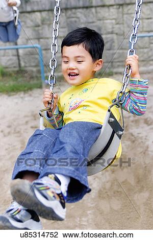 Outdoors, Day, Kids, Children, Playing, Playful, Playground View Large Photo Image Stock Image - Outdoors, Day, Kids, Children, Playing, Playful, Playground. Fotosearch