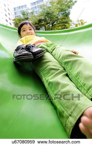 Outdoors, Day, Kids, Children, Playing, Playful, Playground View Large Photo Image Stock Photo - Outdoors, Day, Kids, Children, Playing, Playful, Playground. Fotosearch