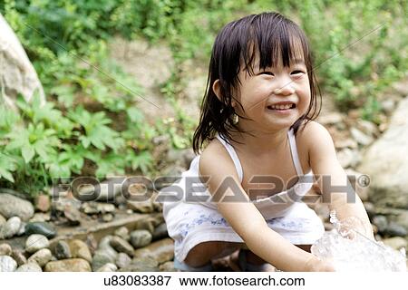 Stock Photo - Outdoors, Day, Kids, Children, Playing, Playful, Playground. Fotosearch