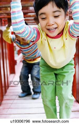 Outdoors, Day, Kids, Children, Playing, Playful, Playground View Large Photo Image Stock Photograph - Outdoors, Day, Kids, Children, Playing, Playful, Playground. Fotosearch