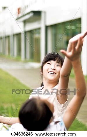 Outdoors, Day, Kids, Children, Playing, Playful, Playground View Large Photo Image Stock Photograph - Outdoors, Day, Kids, Children, Playing, Playful, Playground. Fotosearch