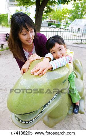 Outdoors, Day, Kids, Children, Playing, Playful, Playground View Large Photo Image Stock Photography - Outdoors, Day, Kids, Children, Playing, Playful, Playground. Fotosearch
