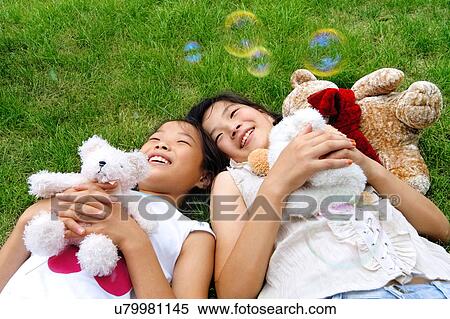 Outdoors, Day, Kids, Children, Playing, Playful, Playground View Large Photo Image Stock Photography - Outdoors, Day, Kids, Children, Playing, Playful, Playground. Fotosearch
