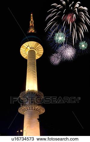 Stock Image - Outdoors, Urban Scene, Building Structure, Building Exterior, Skyscraper, Light, Illuminated. Fotosearch