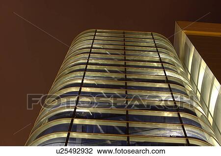 Stock Image - Outdoors, Urban Scene, Building Structure, Building Exterior, Skyscraper, Light, Illuminated. Fotosearch