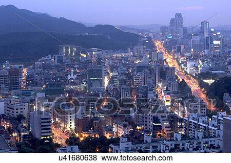 Stock Photo - Outdoors, Urban Scene, Building Structure, Building Exterior, Skyscraper, Light, Illuminated. Fotosearch