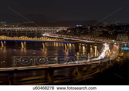 Stock Photo - Outdoors, Urban Scene, Building Structure, Building Exterior, Skyscraper, Light, Illuminated. Fotosearch
