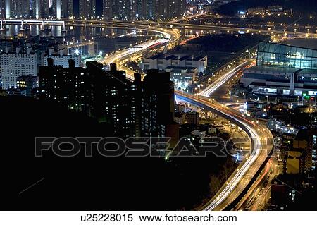 Stock Photography - Outdoors, Urban Scene, Building Structure, Building Exterior, Skyscraper, Light, Illuminated. Fotosearch