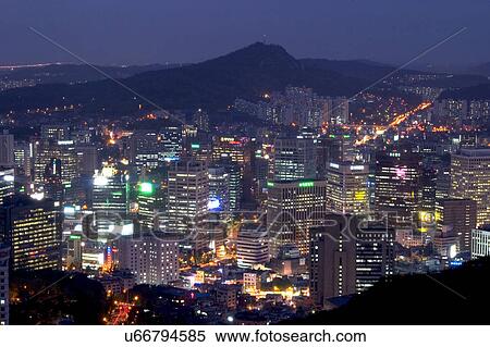 Stock Photography - Outdoors, Urban Scene, Building Structure, Building Exterior, Skyscraper, Light, Illuminated. Fotosearch