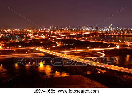 Stock Photography - Outdoors, Urban Scene, Building Structure, Building Exterior, Skyscraper, Light, Illuminated. Fotosearch