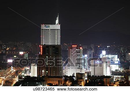 Stock Photography - Outdoors, Urban Scene, Building Structure, Building Exterior, Skyscraper, Light, Illuminated. Fotosearch