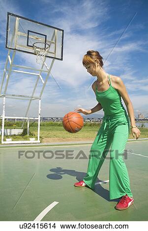 Sports, Basketball, Basketball Player, Dribbling, Hobbies, Outdoors, Day View Large Photo Image Picture - Sports, Basketball, Basketball Player, Dribbling, Hobbies, Outdoors, Day. Fotosearch