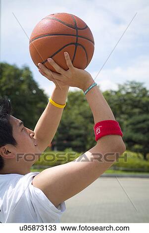 Sports, Basketball, Basketball Player, Dribbling, Hobbies, Outdoors, Day View Large Photo Image Stock Image - Sports, Basketball, Basketball Player, Dribbling, Hobbies, Outdoors, Day. Fotosearch