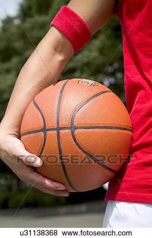 Stock Photo - Sports, Basketball, Basketball Player, Dribbling, Hobbies, Outdoors, Day. Fotosearch