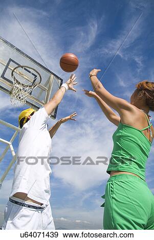Sports, Basketball, Basketball Player, Dribbling, Hobbies, Outdoors, Day View Large Photo Image Stock Photo - Sports, Basketball, Basketball Player, Dribbling, Hobbies, Outdoors, Day. Fotosearch