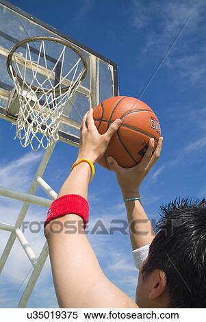 Sports, Basketball, Basketball Player, Dribbling, Hobbies, Outdoors, Day View Large Photo Image Stock Photography - Sports, Basketball, Basketball Player, Dribbling, Hobbies, Outdoors, Day. Fotosearch