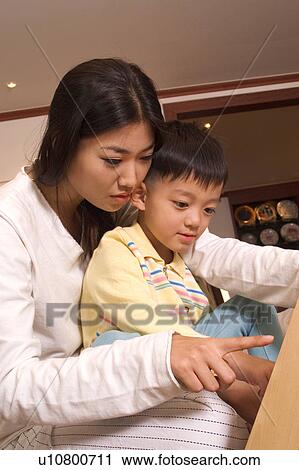Togetherness, Mother, Love, Father, Daughter, Asian Ethnicity View Large Photo Image Stock Image - Togetherness, Mother, Love, Father, Daughter, Asian Ethnicity. Fotosearch