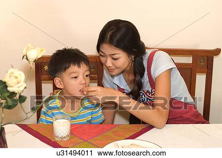 Togetherness, Mother, Love, Father, Daughter, Asian Ethnicity View Large Photo Image Stock Image - Togetherness, Mother, Love, Father, Daughter, Asian Ethnicity. Fotosearch