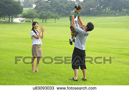 Togetherness, Mother, Love, Father, Daughter, Asian Ethnicity View Large Photo Image Stock Image - Togetherness, Mother, Love, Father, Daughter, Asian Ethnicity. Fotosearch