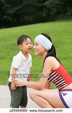 Togetherness, Mother, Love, Father, Daughter, Asian Ethnicity View Large Photo Image Stock Photo - Togetherness, Mother, Love, Father, Daughter, Asian Ethnicity. Fotosearch
