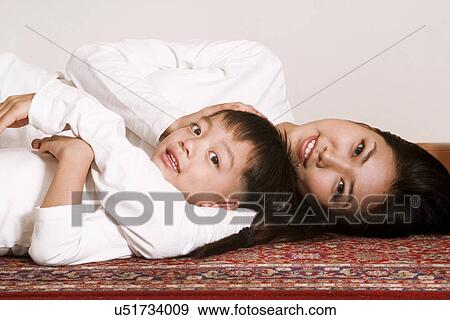Togetherness, Mother, Love, Father, Daughter, Asian Ethnicity View Large Photo Image Stock Photo - Togetherness, Mother, Love, Father, Daughter, Asian Ethnicity. Fotosearch