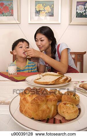 Togetherness, Mother, Love, Father, Daughter, Asian Ethnicity View Large Photo Image Stock Photo - Togetherness, Mother, Love, Father, Daughter, Asian Ethnicity. Fotosearch