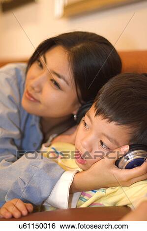 Togetherness, Mother, Love, Father, Daughter, Asian Ethnicity View Large Photo Image Stock Photograph - Togetherness, Mother, Love, Father, Daughter, Asian Ethnicity. Fotosearch