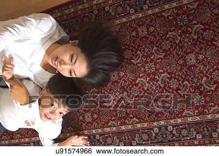 Togetherness, Mother, Love, Father, Daughter, Asian Ethnicity View Large Photo Image Stock Photograph - Togetherness, Mother, Love, Father, Daughter, Asian Ethnicity. Fotosearch