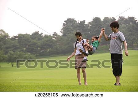 Togetherness, Mother, Love, Father, Daughter, Asian Ethnicity View Large Photo Image Stock Photography - Togetherness, Mother, Love, Father, Daughter, Asian Ethnicity. Fotosearch