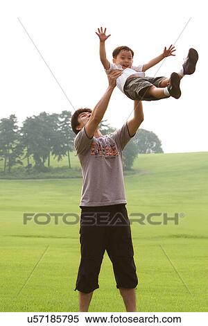 Togetherness, Mother, Love, Father, Daughter, Asian Ethnicity View Large Photo Image Stock Photography - Togetherness, Mother, Love, Father, Daughter, Asian Ethnicity. Fotosearch